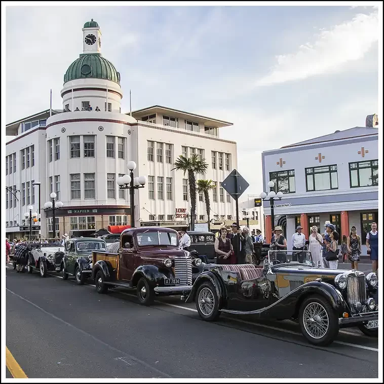 Period cars on Marine Parade with Hawkes Bay Scenic Tours